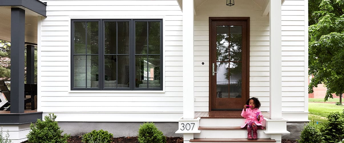 Pella Reserve front entry door farmhouse-style home
