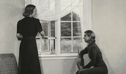 A 1937-released Pella Deluxe Casement window advertisement featuring two women standing by the window.