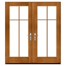 Cross Double wooden French doors with divided glass panels and metal handles in an oak finish