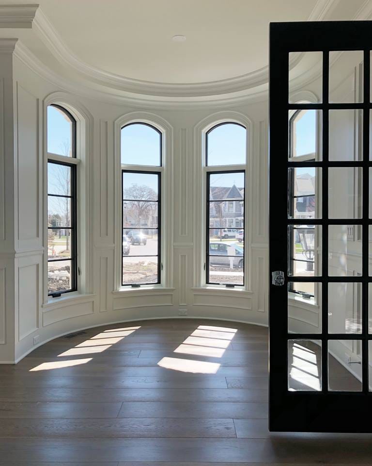 Arch Top Casement Windows Illuminate Circular Room Arch top casement windows fit in round shaped room