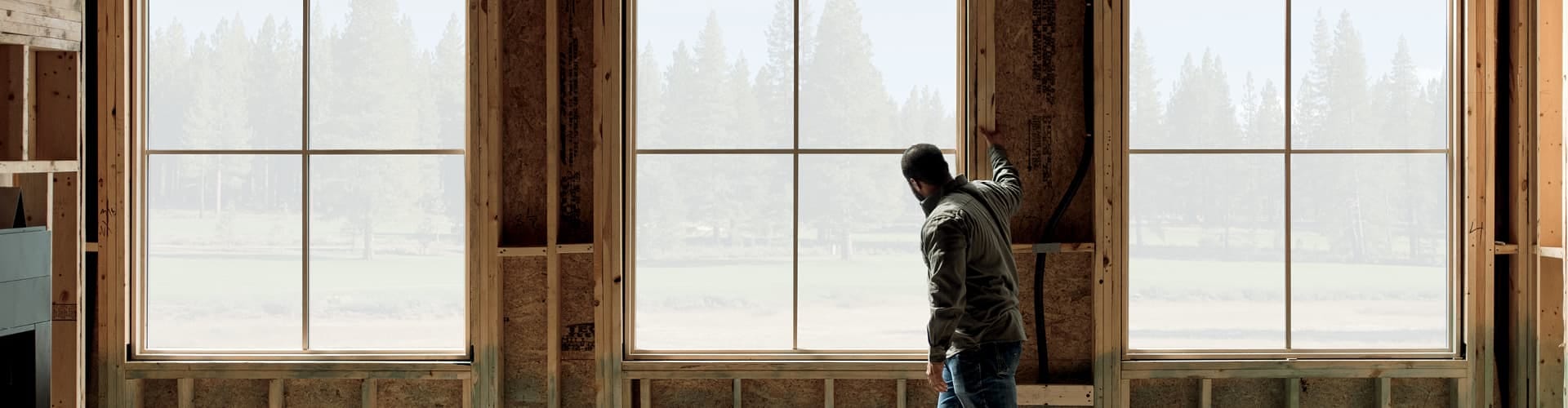 the pella sticker on a new window in a home under construction