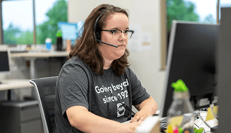 customer service representative working with a customer