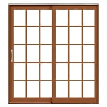 Traditional lifestyle sliding patio door with traditional grilles