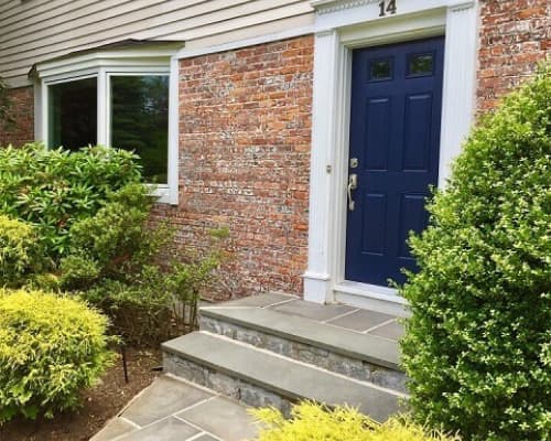 traditional solid front door dark blue finish