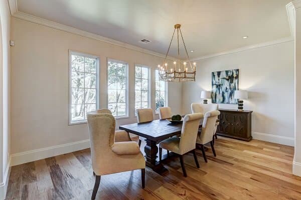 Traditional Window Grille Pattern For Classic Dining Room Traditional style dining room with wood floors and a row of white casement windows