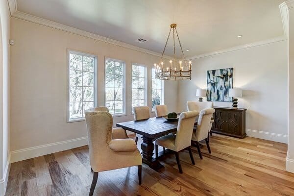 Traditional Window Grille Pattern For Classic Dining Room Traditional style dining room with wood floors and a row of white casement windows