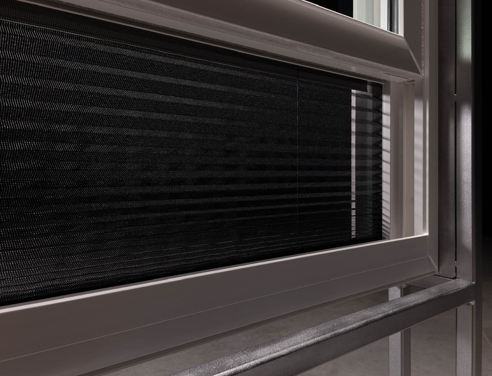 a vinyl double-hung window with the hidden screen incorporated