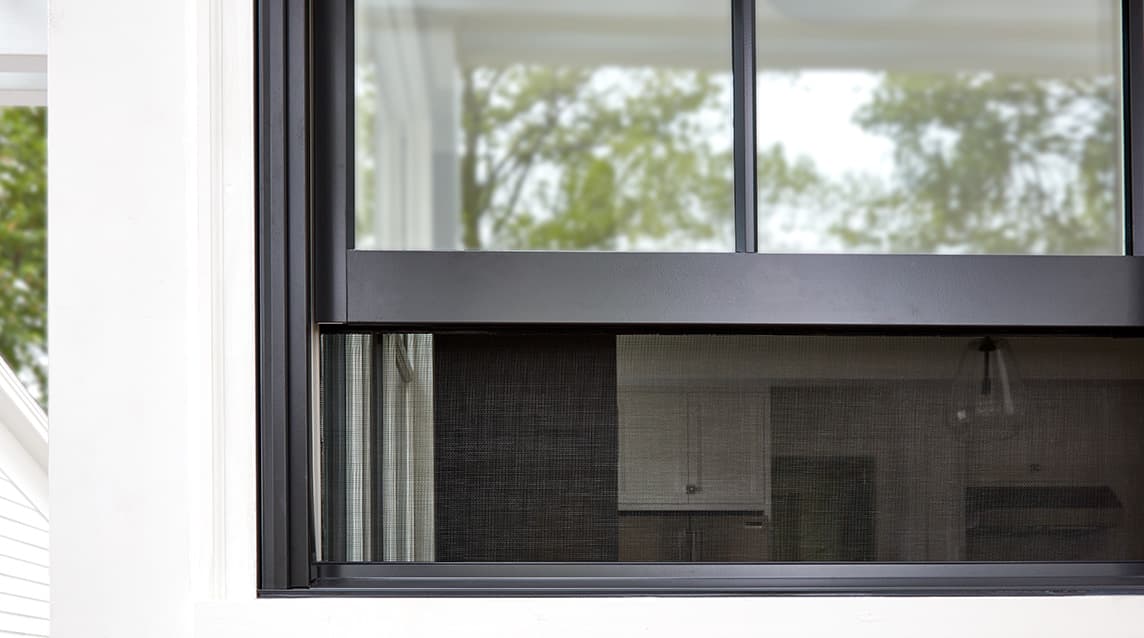 Integrated rolscreen on white house.