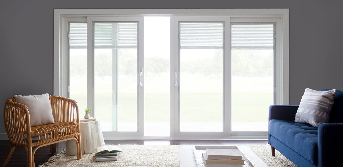 four panel sliding door that is open in the middle