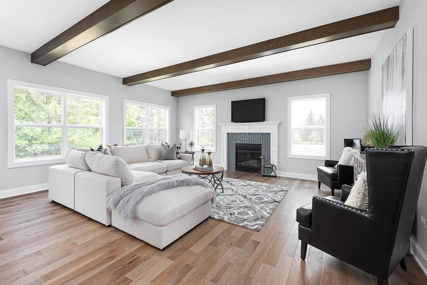 Large Double-Hung Windows Light Cozy Living Room Large double-hung windows on each wall light living room