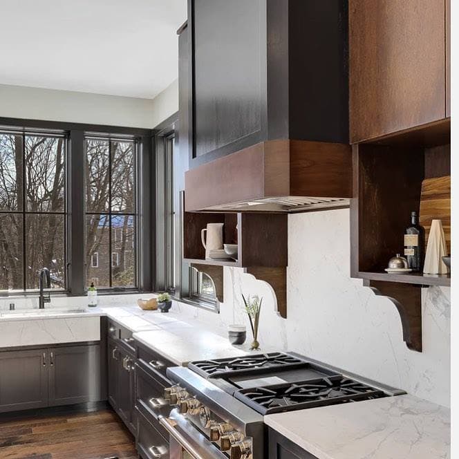 Black Windows & Wood Cabinets In Modern Kitchen white kitchen walls are contrasted by black windows over the sink and wood cabinets over the stove