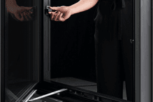 Pella's Easy Slide Operator is demonstrated on a black casement window.