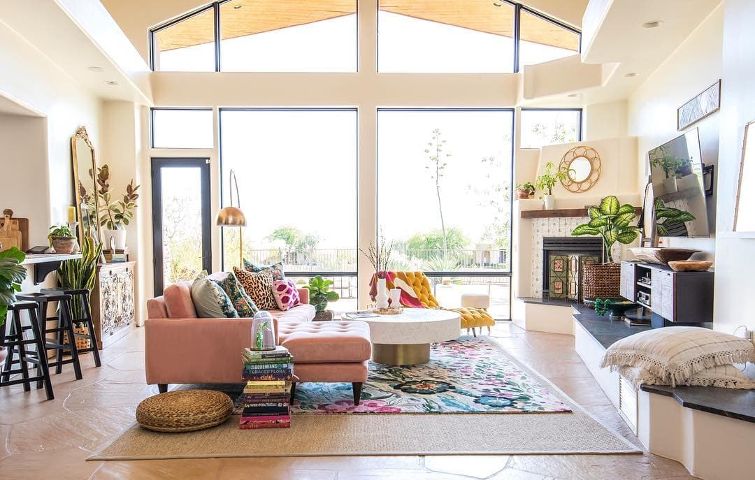 Creative Picture Window Wall Radiates Personality Large, special shape windows and a hinged patio door come together for a wall of glass in eclectic living room