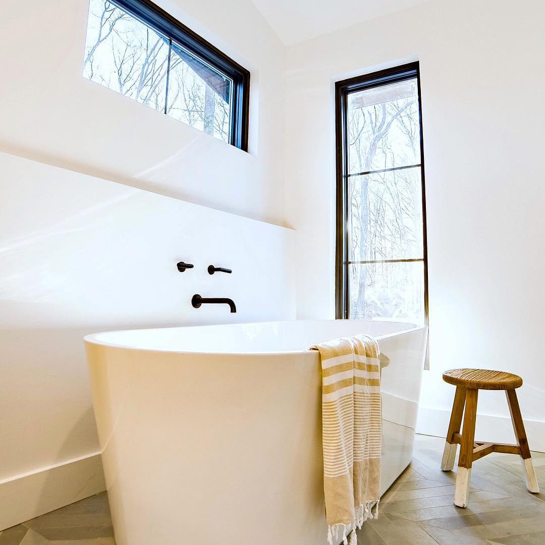 Black Windows Accent Contemporary Bathroom Design white bathroom with black windows framing a free standing tub
