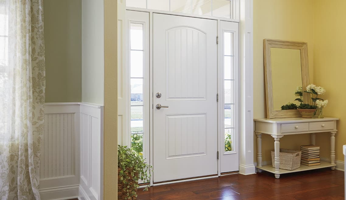 black contemporary entry door with full glass sidelights