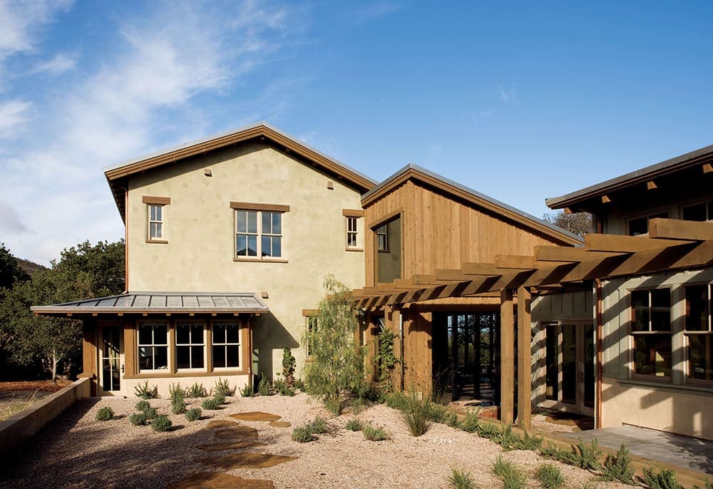 A southwestern home exterior with wood and stucco siding.