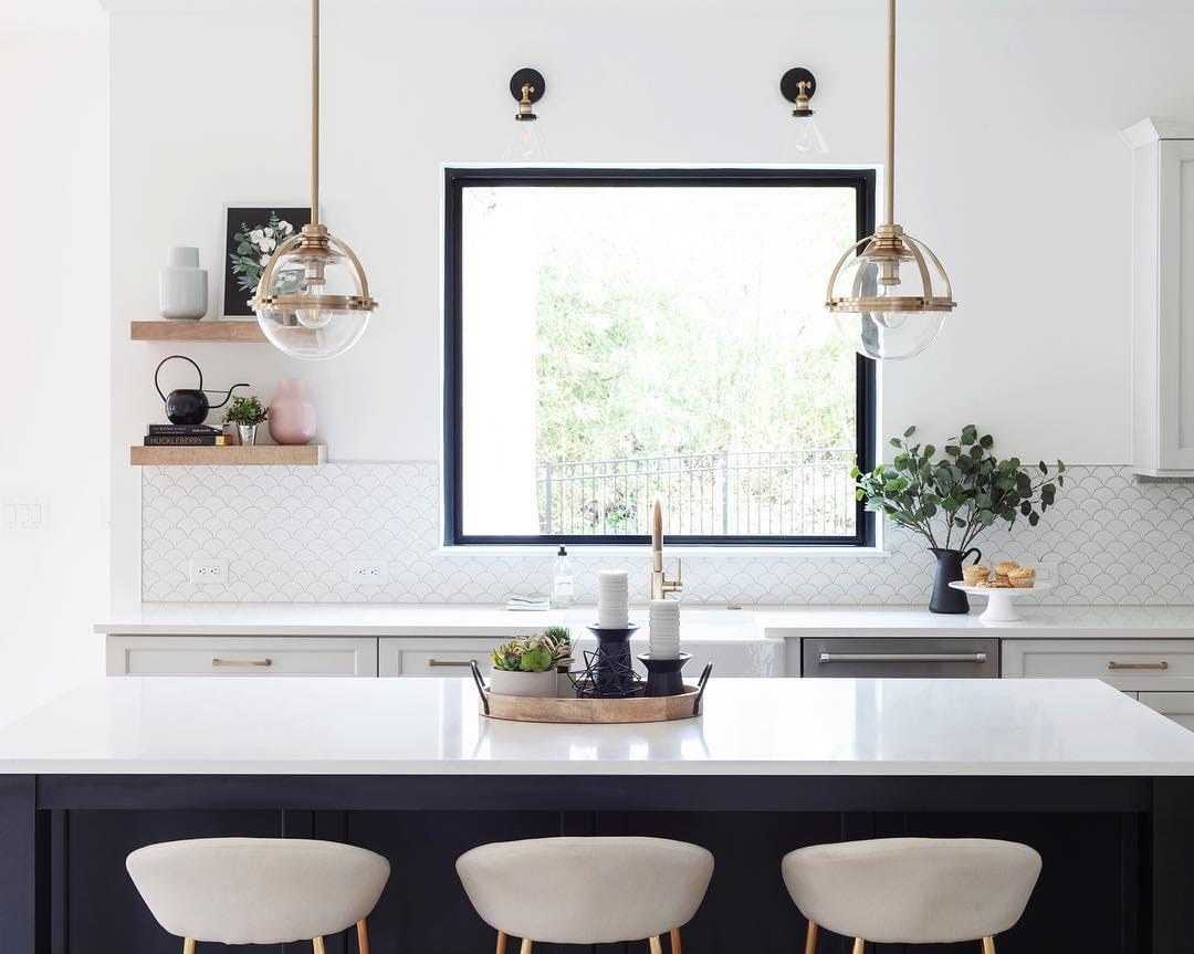 Fiberglass Picture Window Complements Modern Kitchen Design bar stools pulled up to kitchen island overlooking large picture window