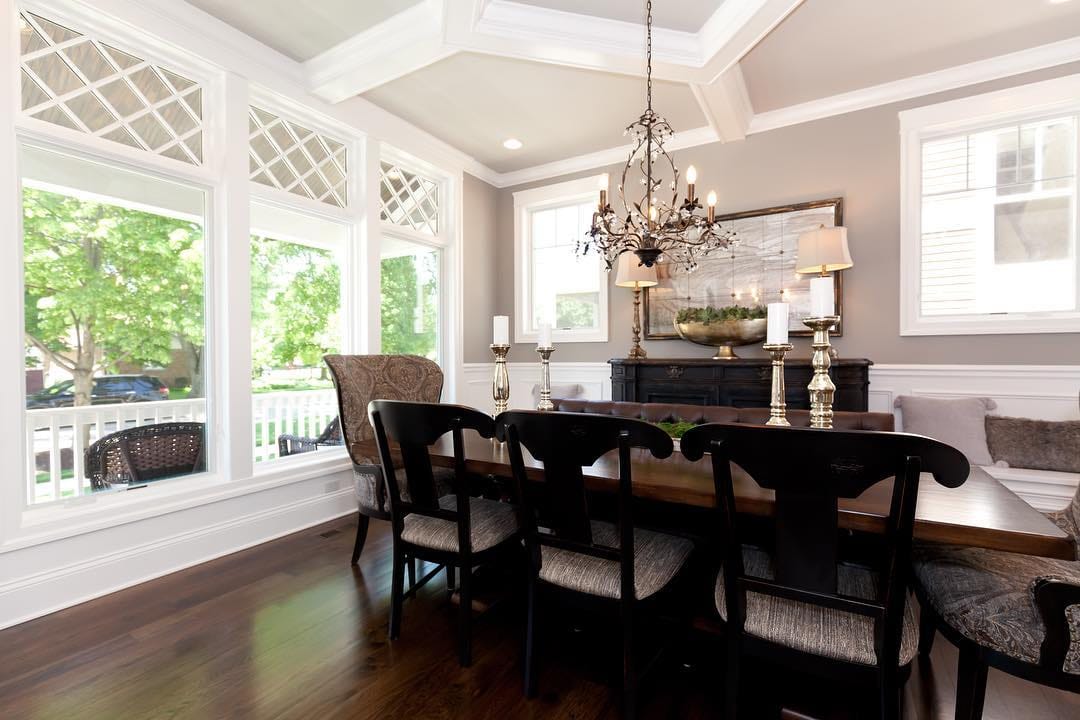 Traditional Casement Windows Create Contrast In Dining Room white casement windows and dark wood furniture in traditional dining room