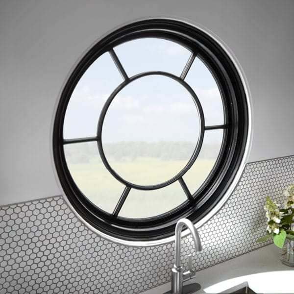 custom circular window over a kitchen sink