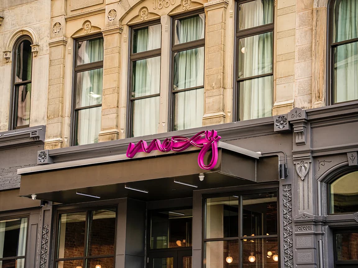 Black Pella Reserve commercial windows on a historic building facade in Cincinnati, OH.