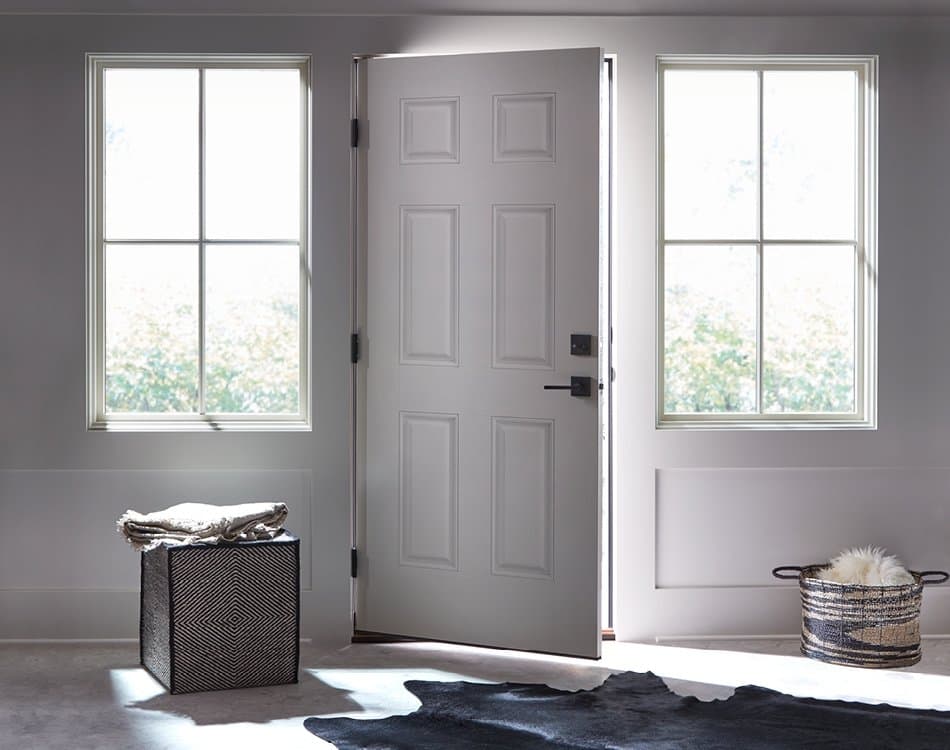 White Front Door & Windows Make For A Beautiful Entryway Contemporary white door open a crack with two white windows on either side