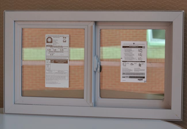 A white sliding window with labels containing window information on each panel.