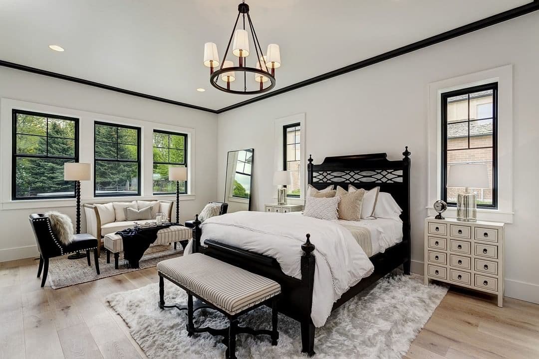 Black Window Frames Make Bold Statement black and white bedroom with black frame windows