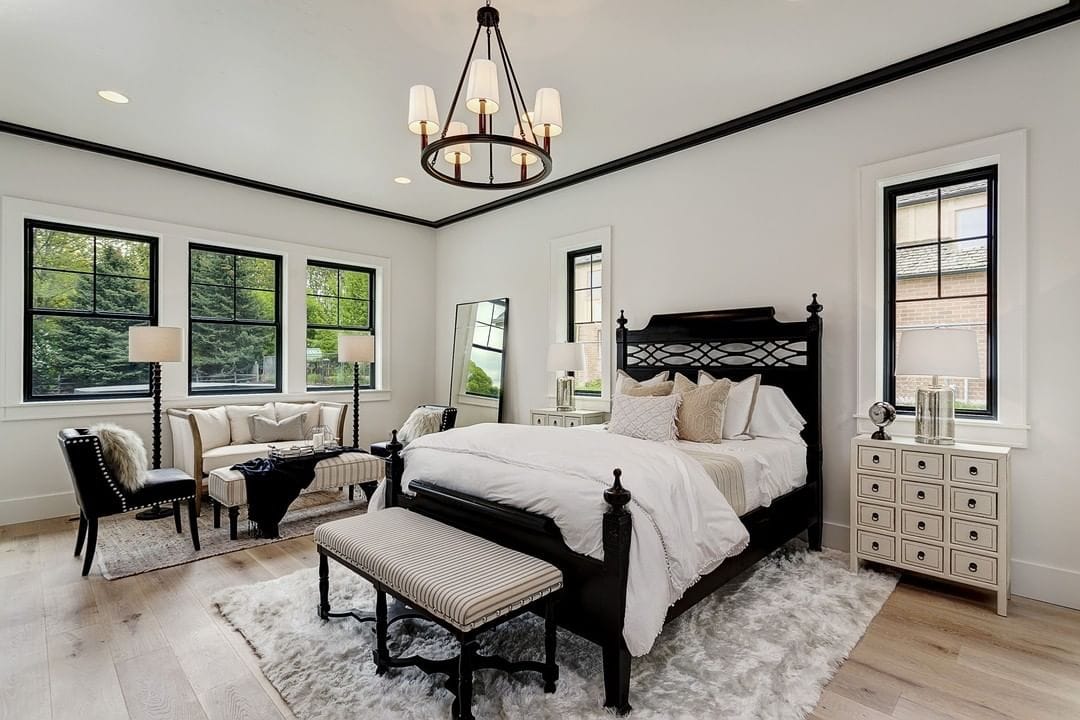 Black Window Frames Make Bold Statement black and white bedroom with black frame windows