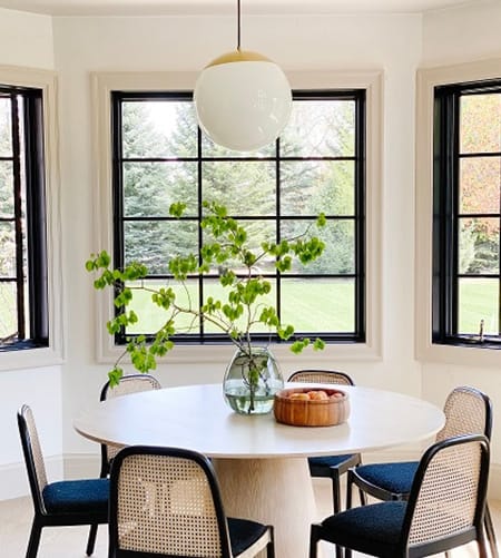 Breakfast nook with black frame windows