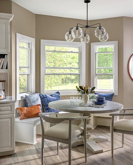 Windows in a breakfast nook in home.