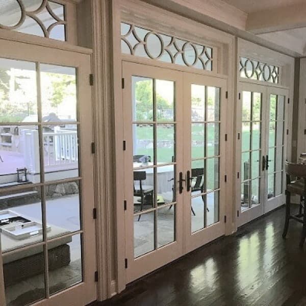 custom french patio doors with custom transoms overhead