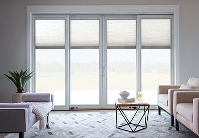 lifestyle living room with large four-panel sliding patio door