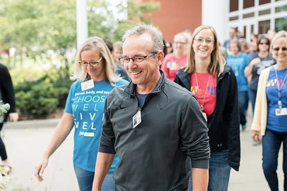pella team members walking for charity