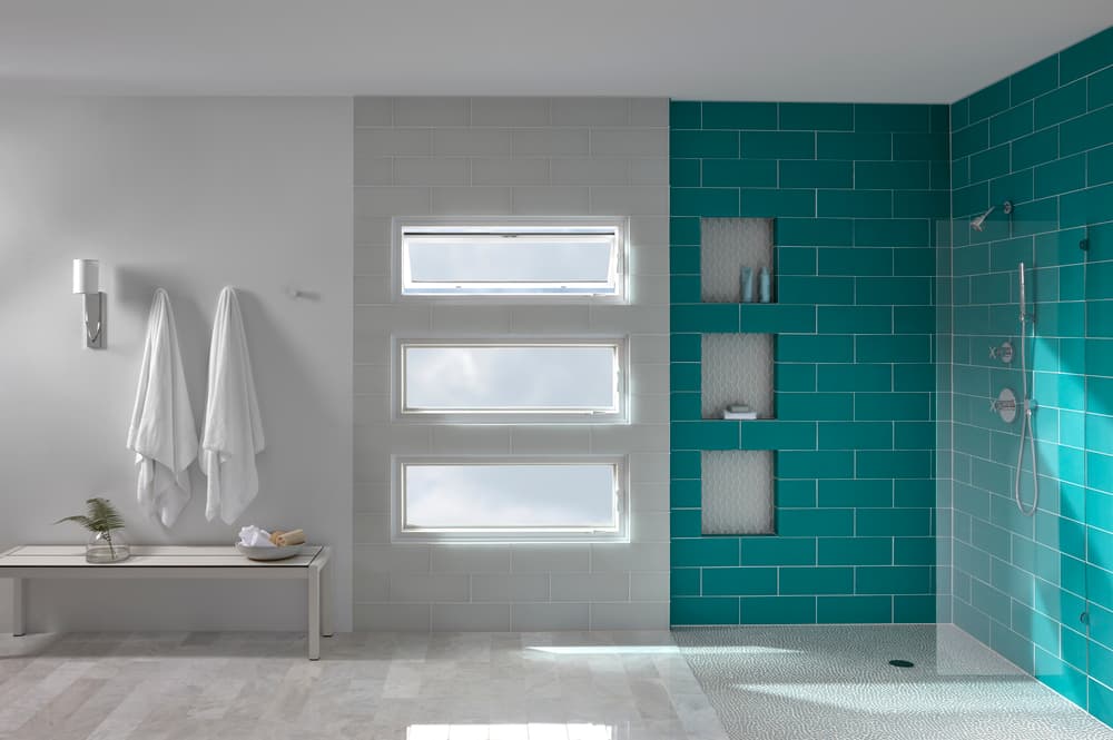 Stunning Stack Of Awning Windows For Contemporary Bathroom Teal tile shower next to a stack of three awning windows with the top window vented