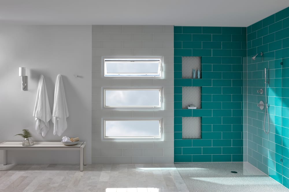 Stunning Stack Of Awning Windows For Contemporary Bathroom Teal tile shower next to a stack of three awning windows with the top window vented