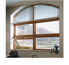 two arched fixed windows, stacked over 4 awning windows
