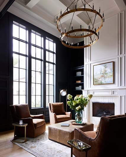 Fixed windows in a dark study brighten up the space.