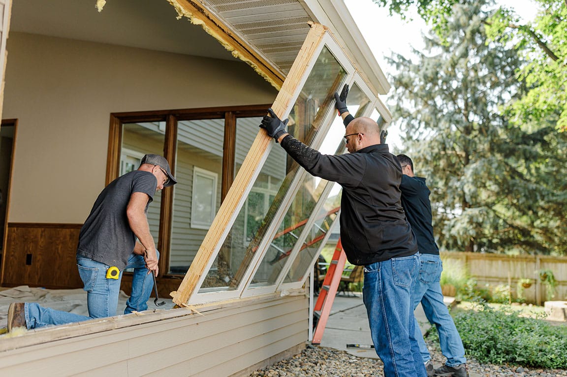 Pella window replacement in progress on a residential home.
