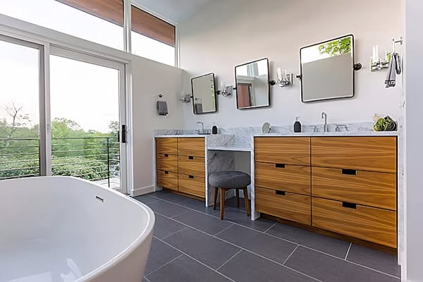 Windows & Patio Door Make Wall Of Glass for Modern Bathroom Modern bathroom with wood double vanities and wall of glass with fixed windows and sliding patio door