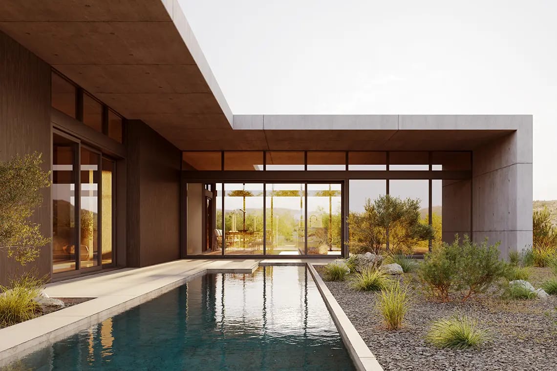 A modern contemporary home with a large stone overhang surrounds a small wading pool.