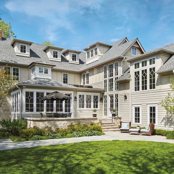 front view of the morgante luxury home with custom window grilles