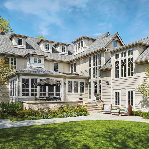 front view of the morgante luxury home with custom window grilles