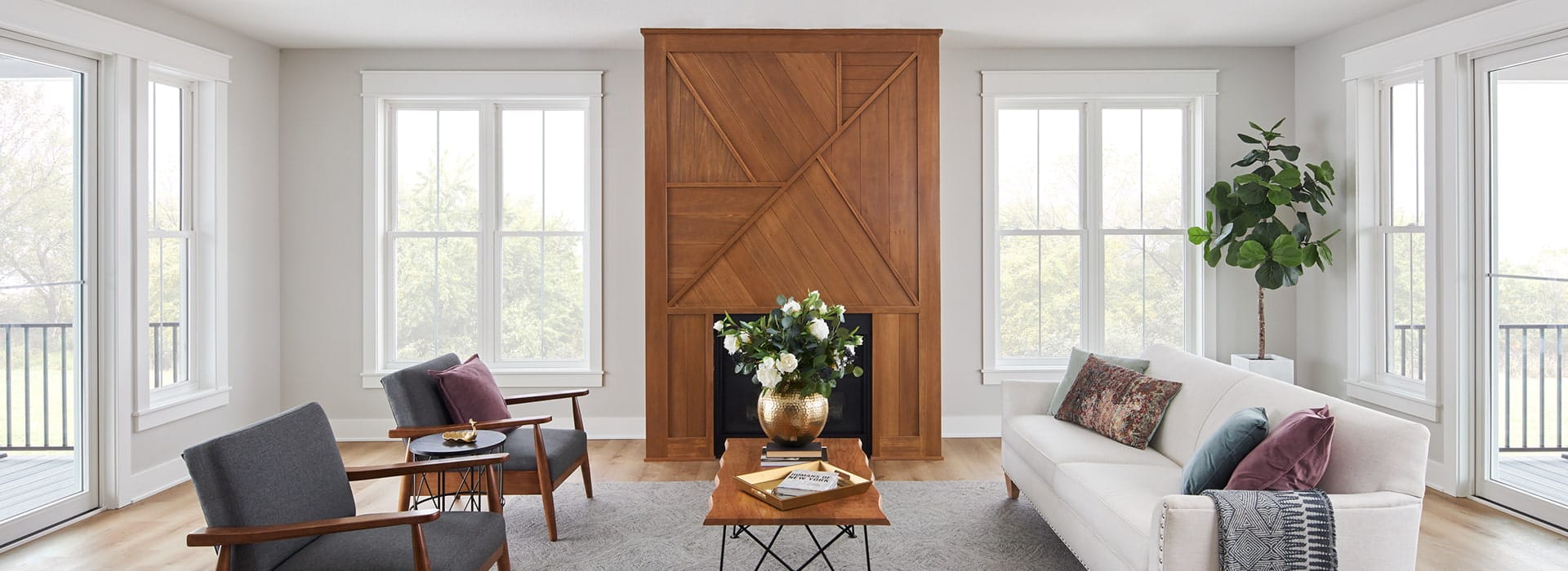 encompass by pella living room with double-hung windows and sliding door